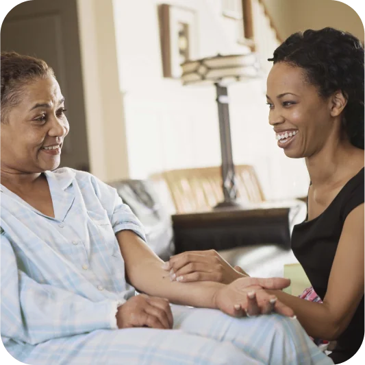 caregiver helps her patient